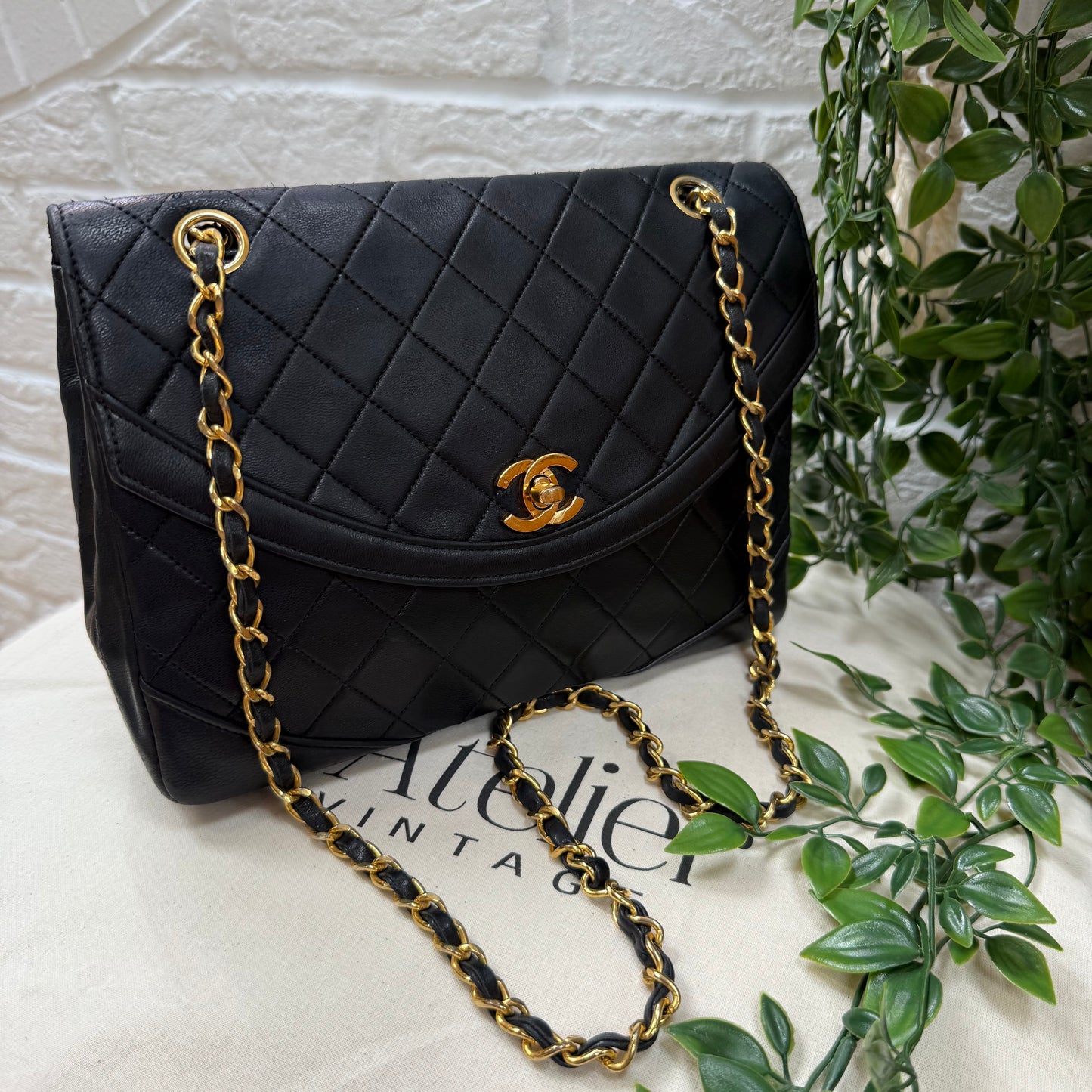 Chanel 1986 black half moon two way single flap