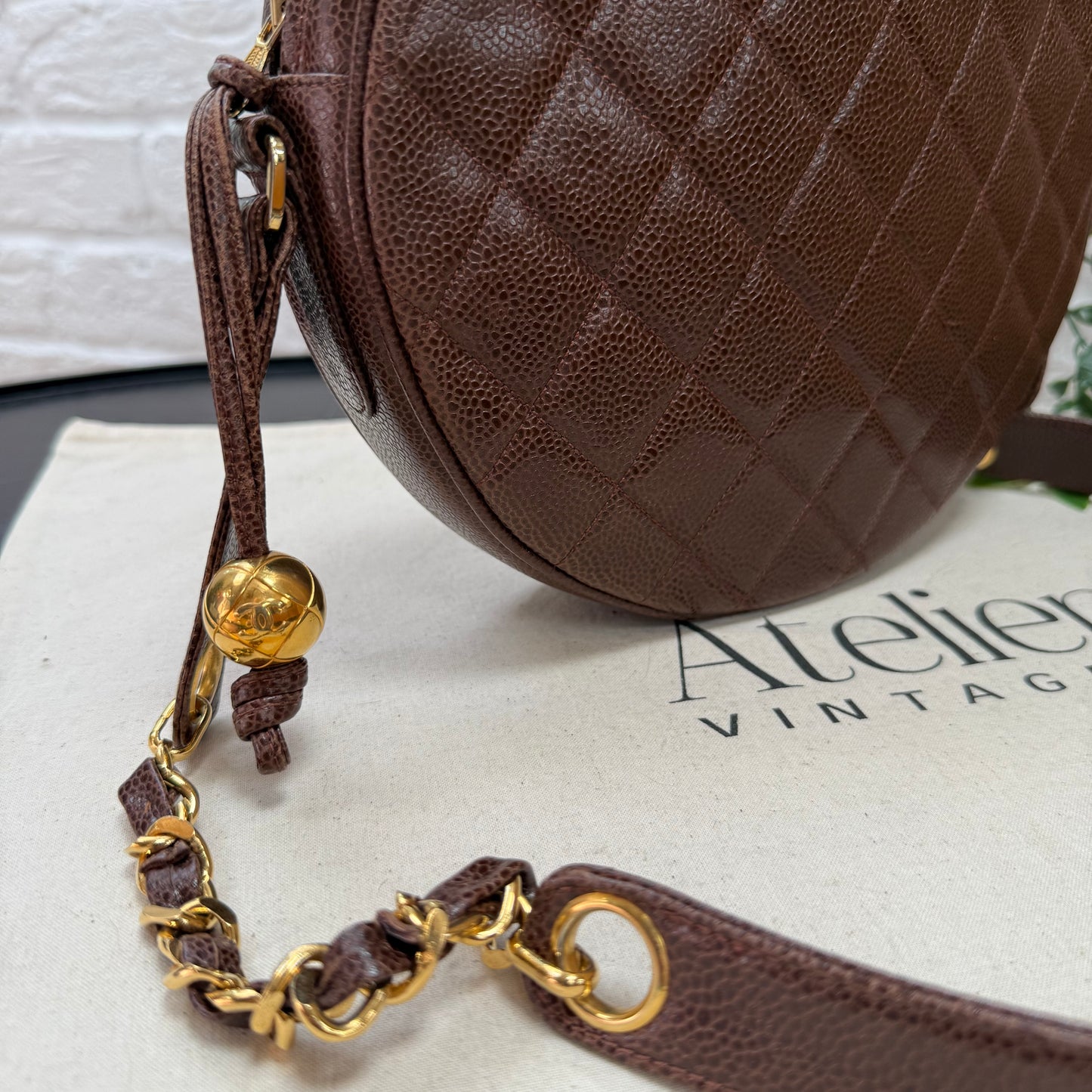 Chanel 1991 chocolate Caviar Quilted Circle Cross Body
