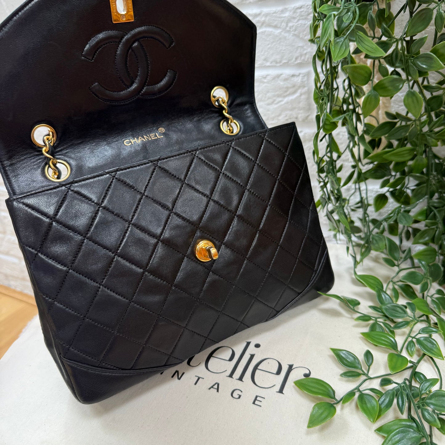 Chanel 1986 black half moon two way single flap