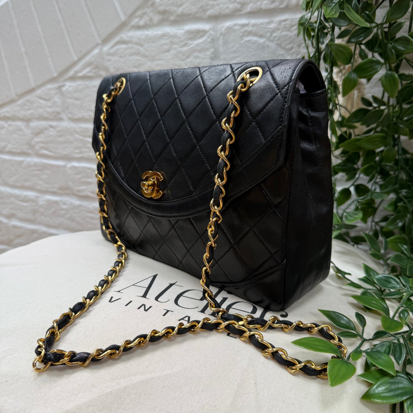 Chanel 1986 black half moon two way single flap