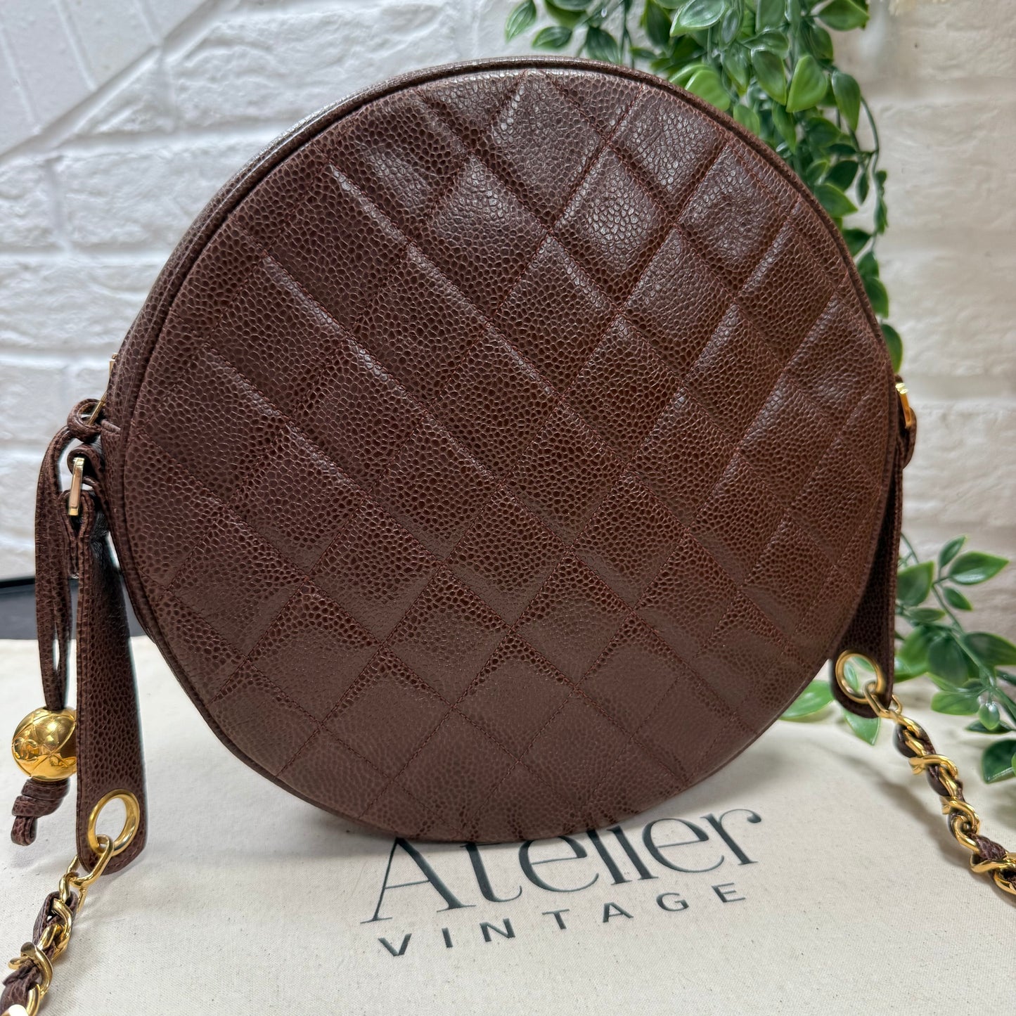 Chanel 1991 chocolate Caviar Quilted Circle Cross Body