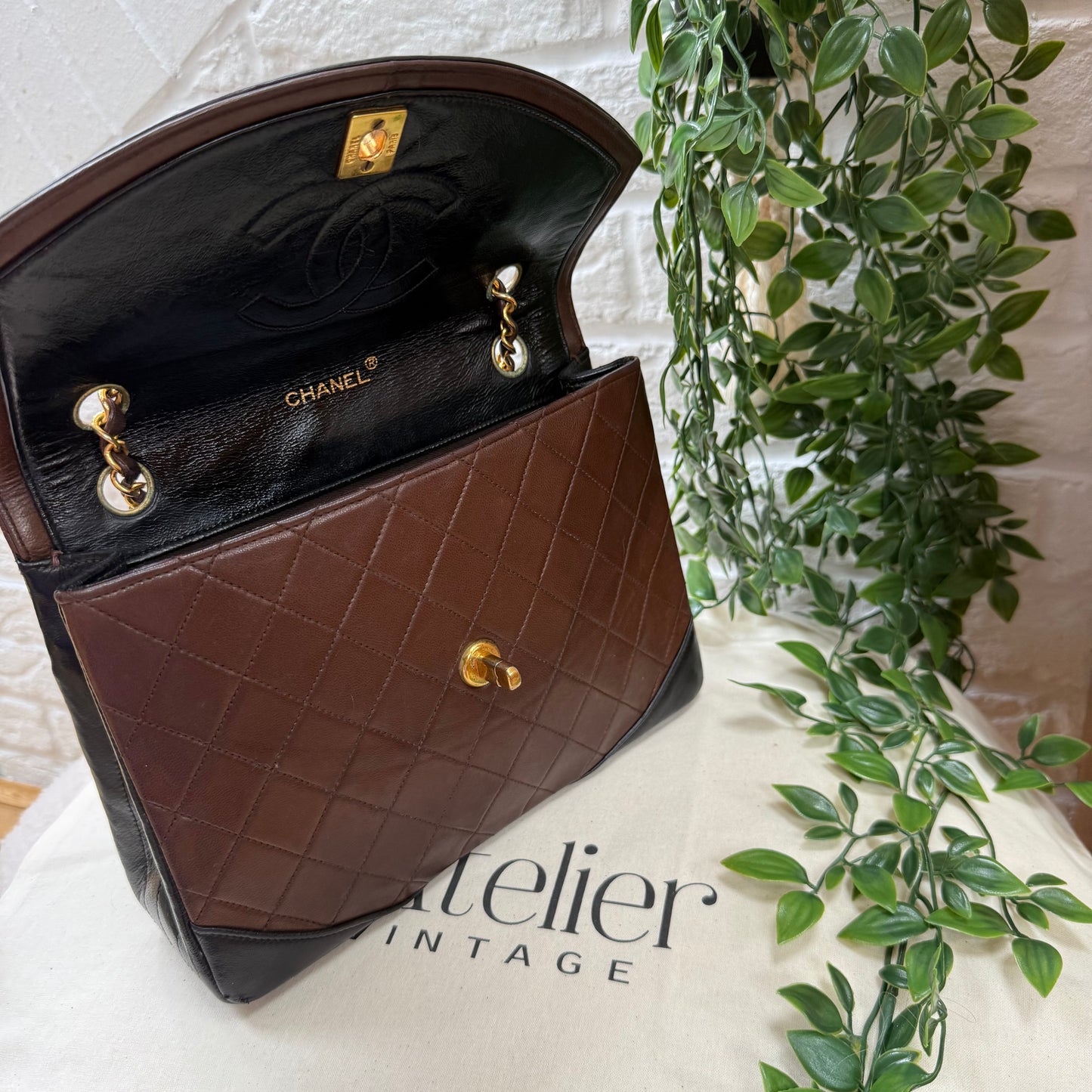 Chanel 1986 chocolate brown & black half moon two way single flap