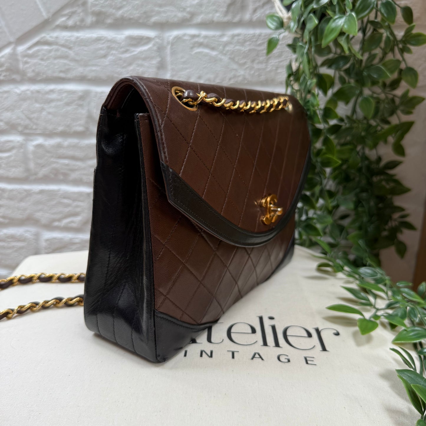 Chanel 1986 chocolate brown & black half moon two way single flap