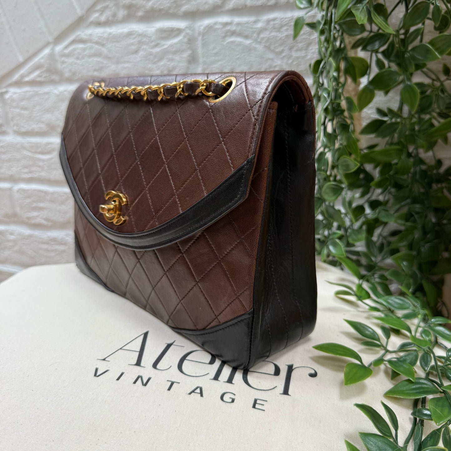 Chanel 1986 chocolate brown & black half moon two way single flap