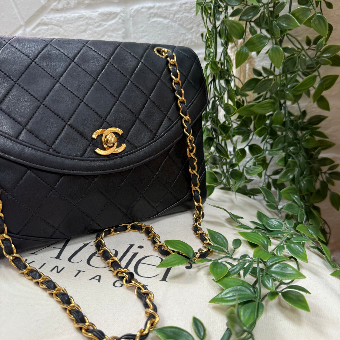 Chanel 1986 black half moon two way single flap