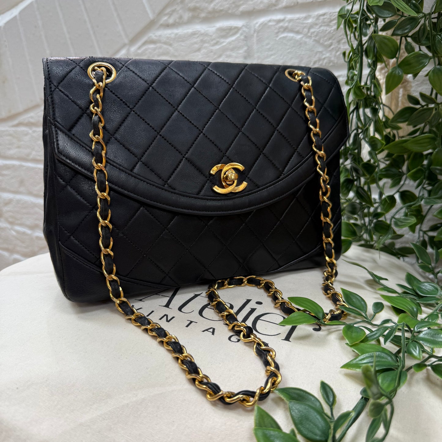 Chanel 1986 black half moon two way single flap