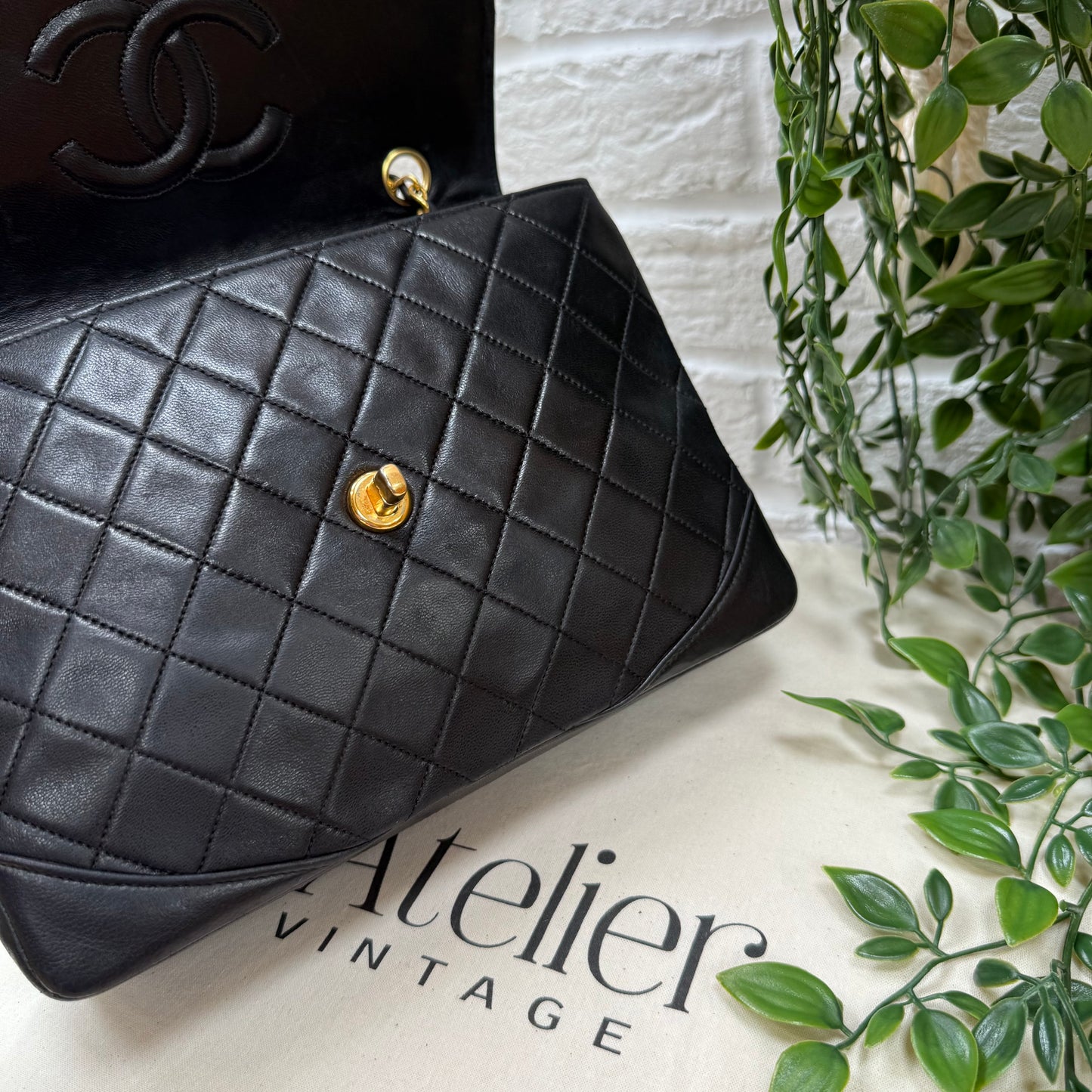 Chanel 1986 black half moon two way single flap
