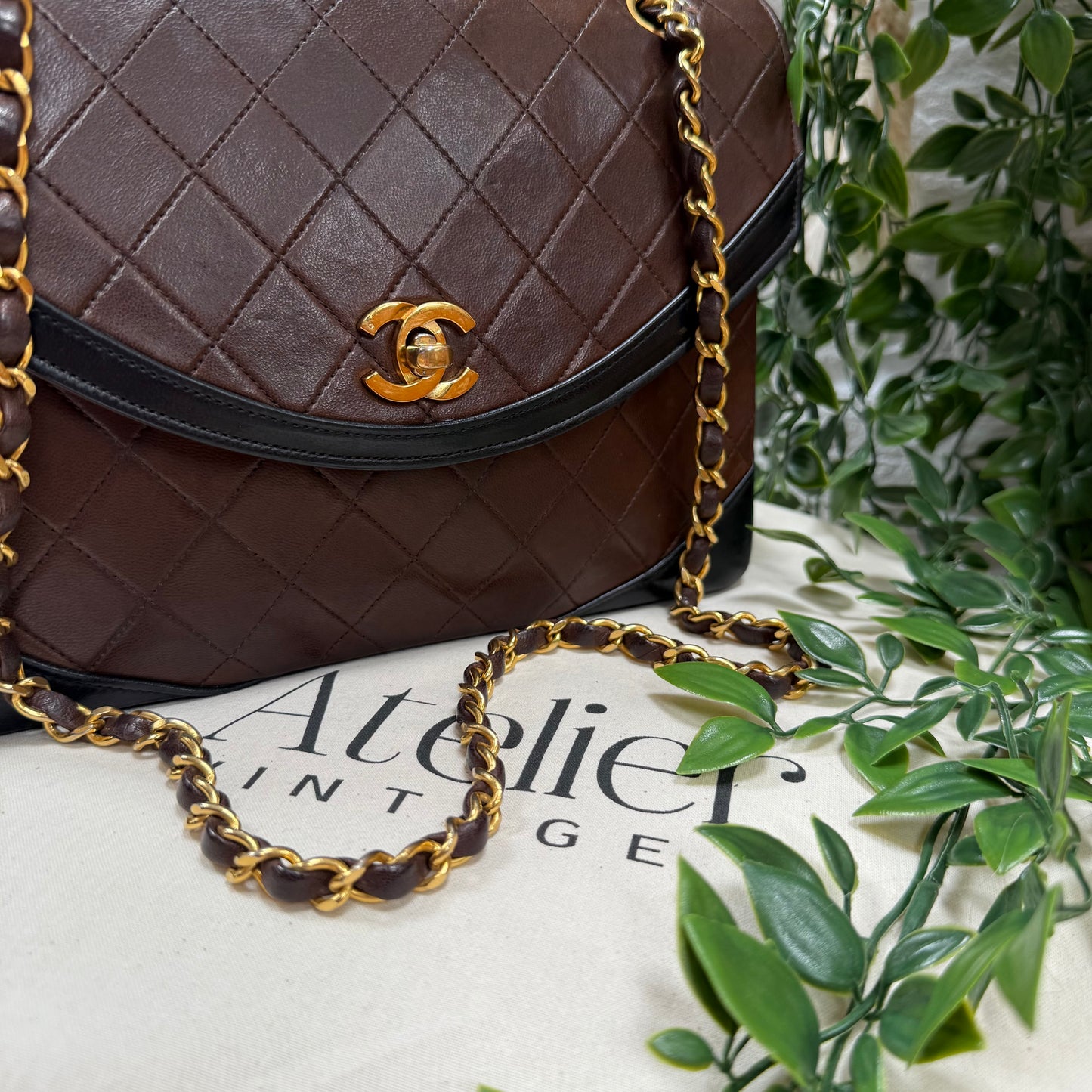 Chanel 1986 chocolate brown & black half moon two way single flap