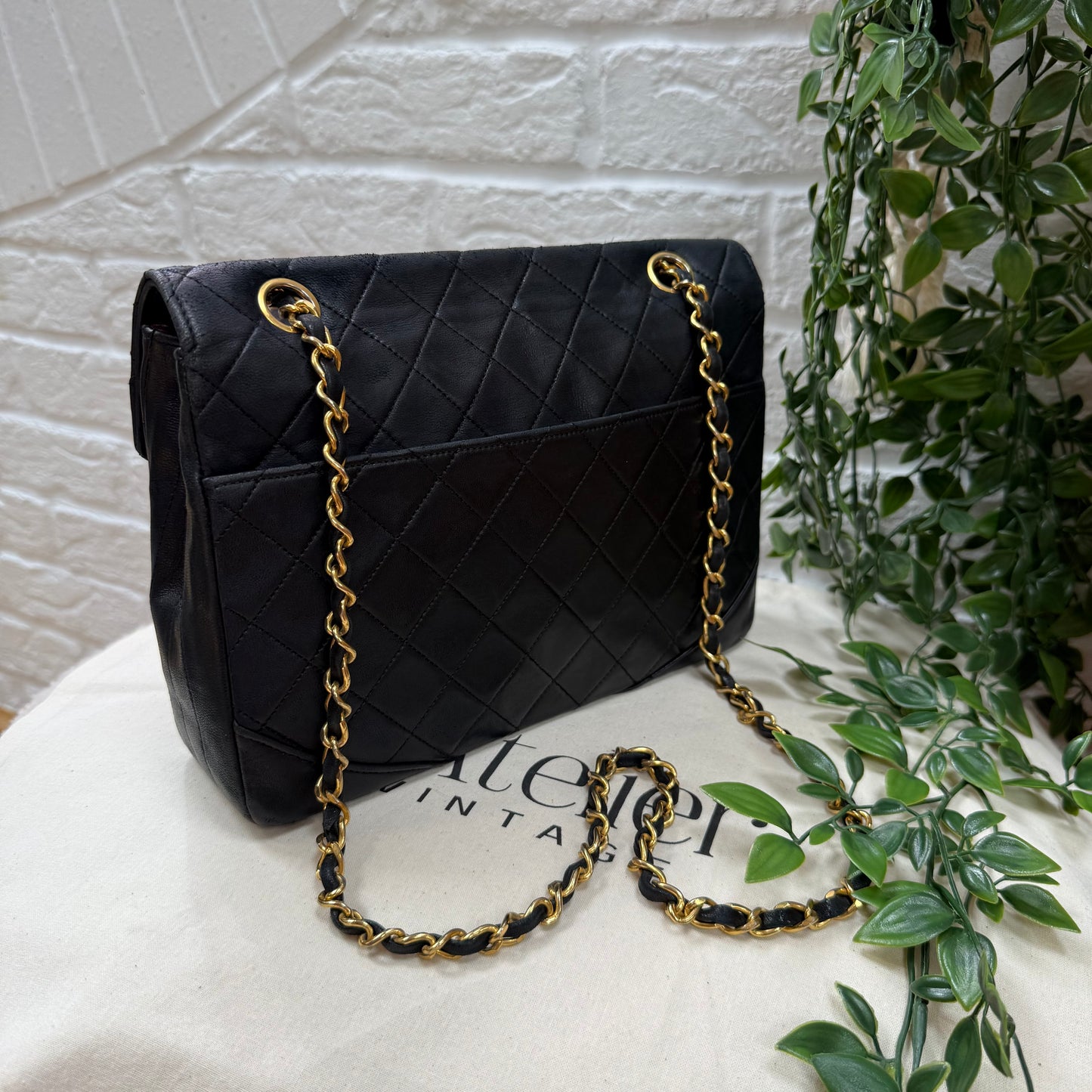 Chanel 1986 black half moon two way single flap