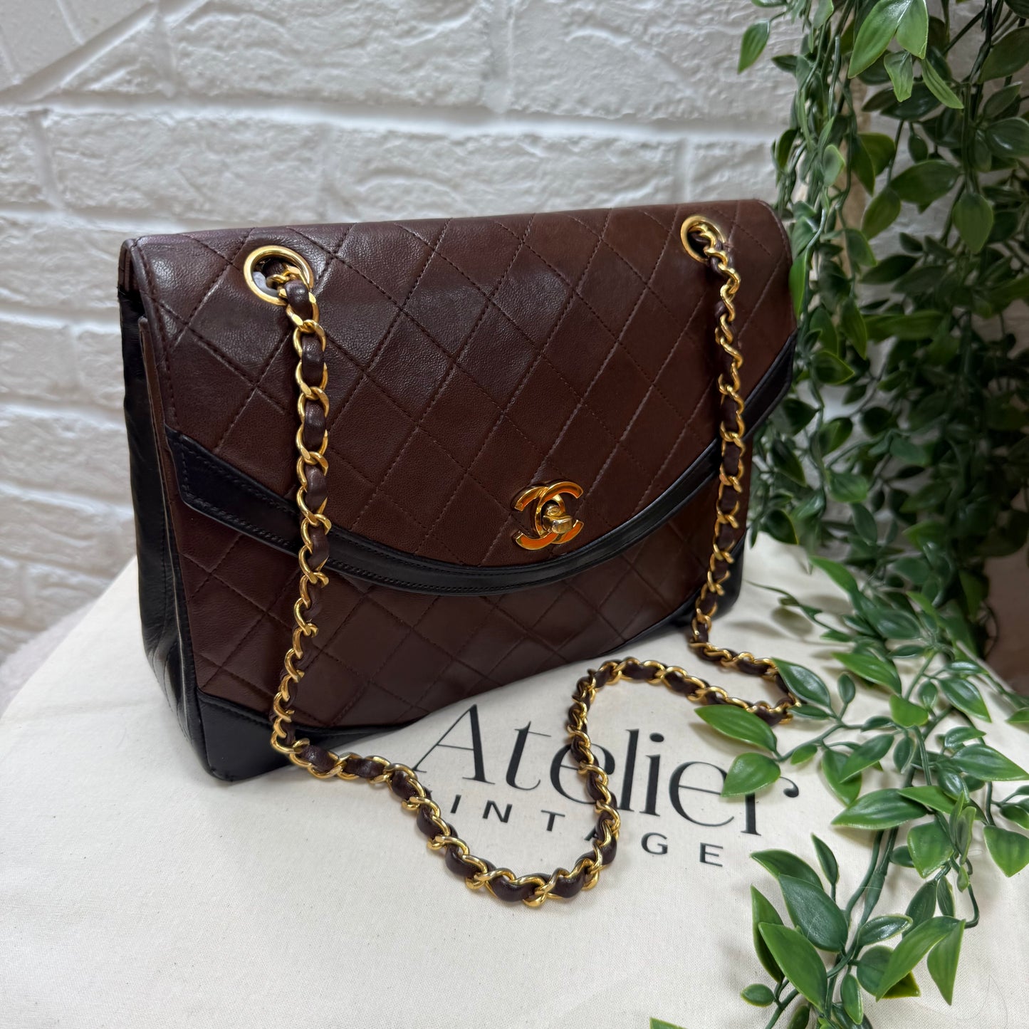 Chanel 1986 chocolate brown & black half moon two way single flap