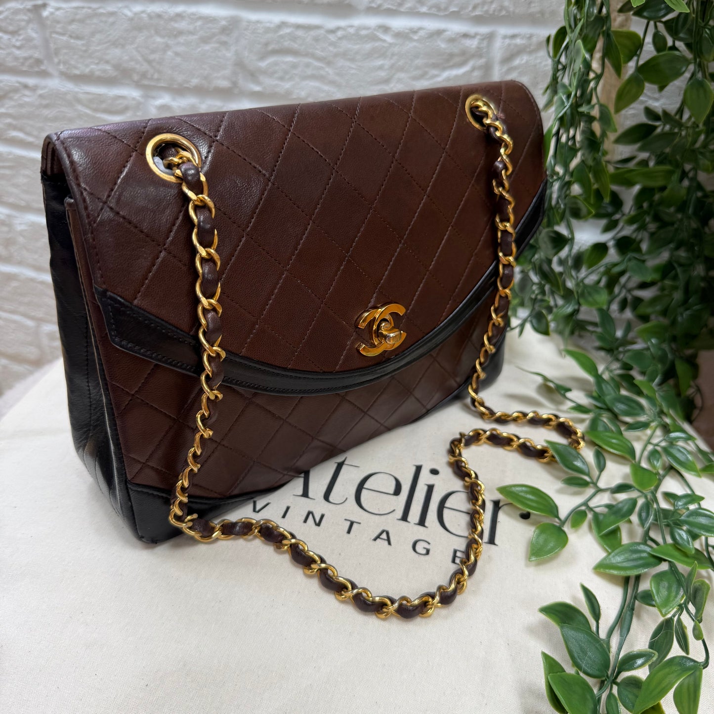 Chanel 1986 chocolate brown & black half moon two way single flap