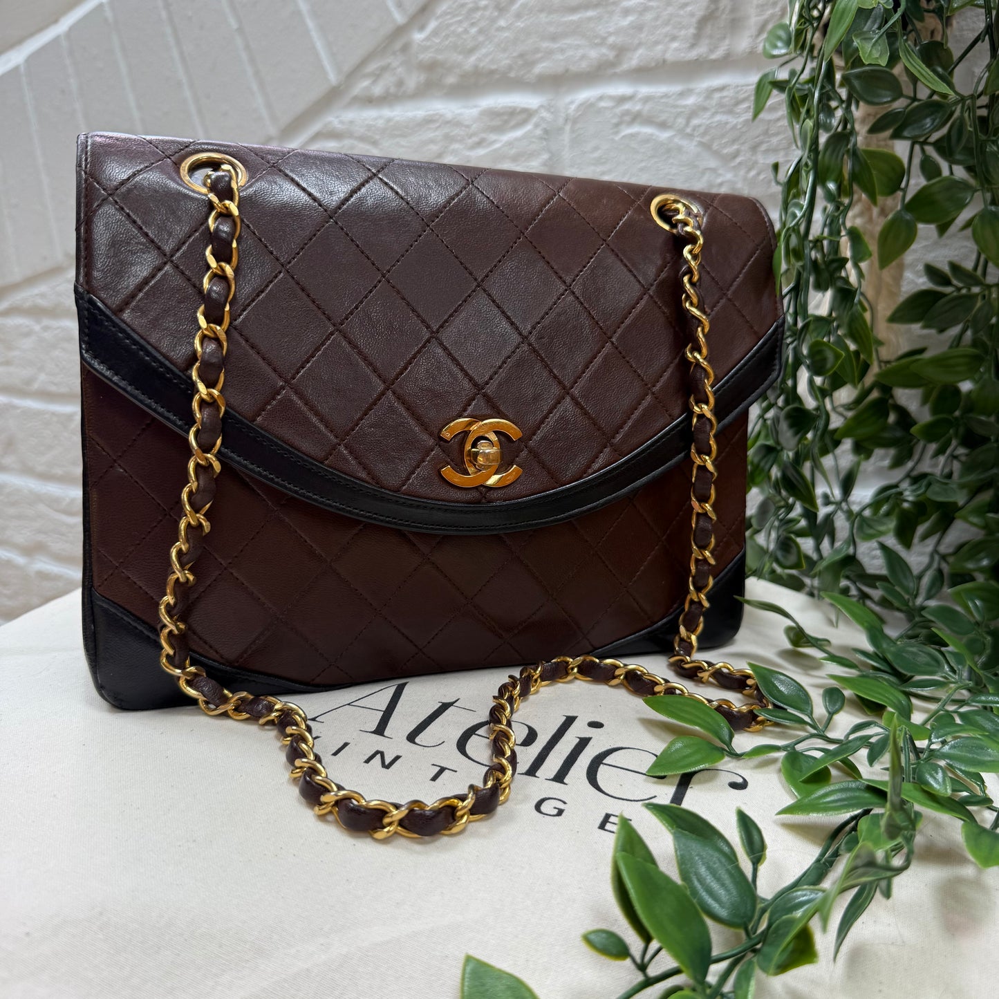 Chanel 1986 chocolate brown & black half moon two way single flap
