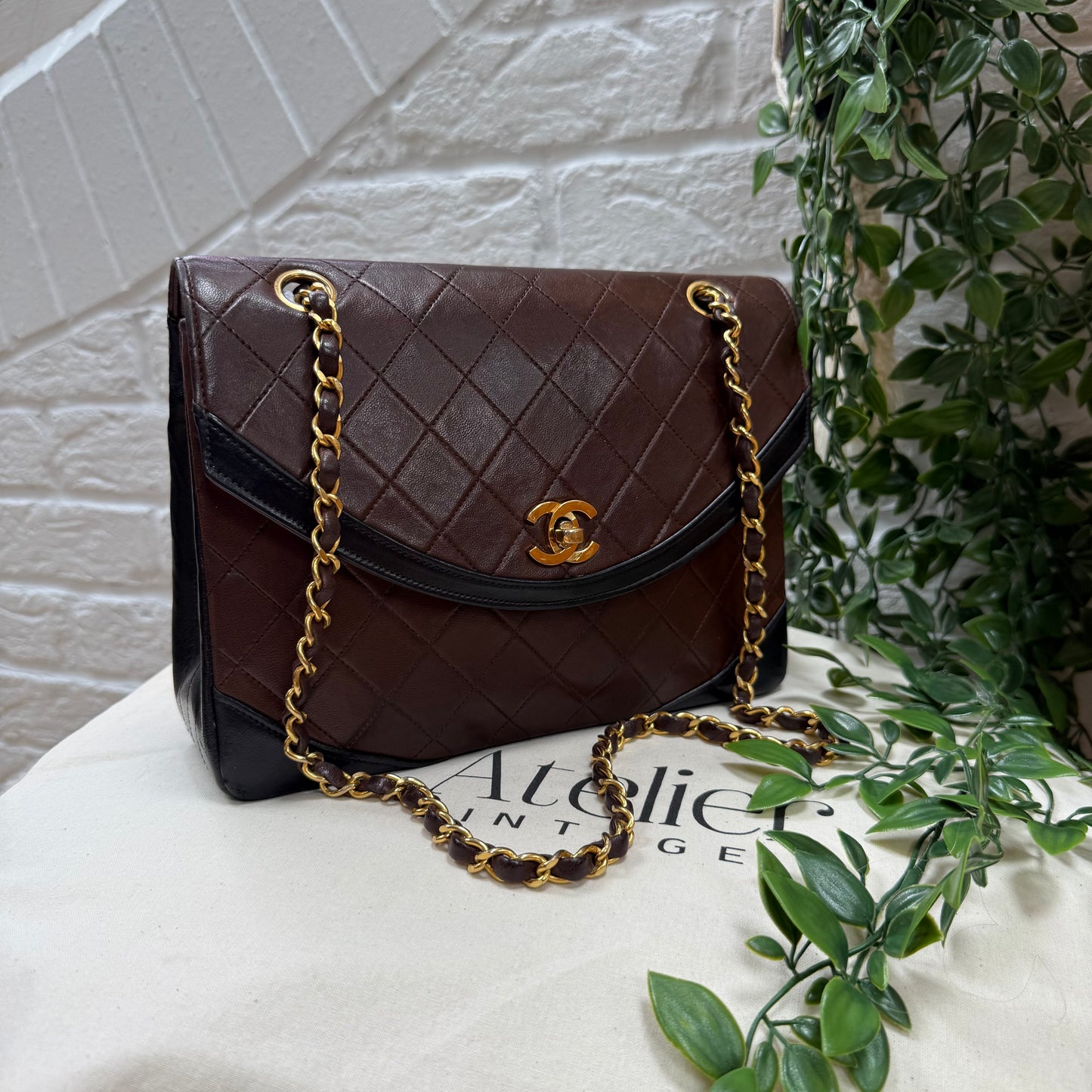 Chanel 1986 chocolate brown & black half moon two way single flap
