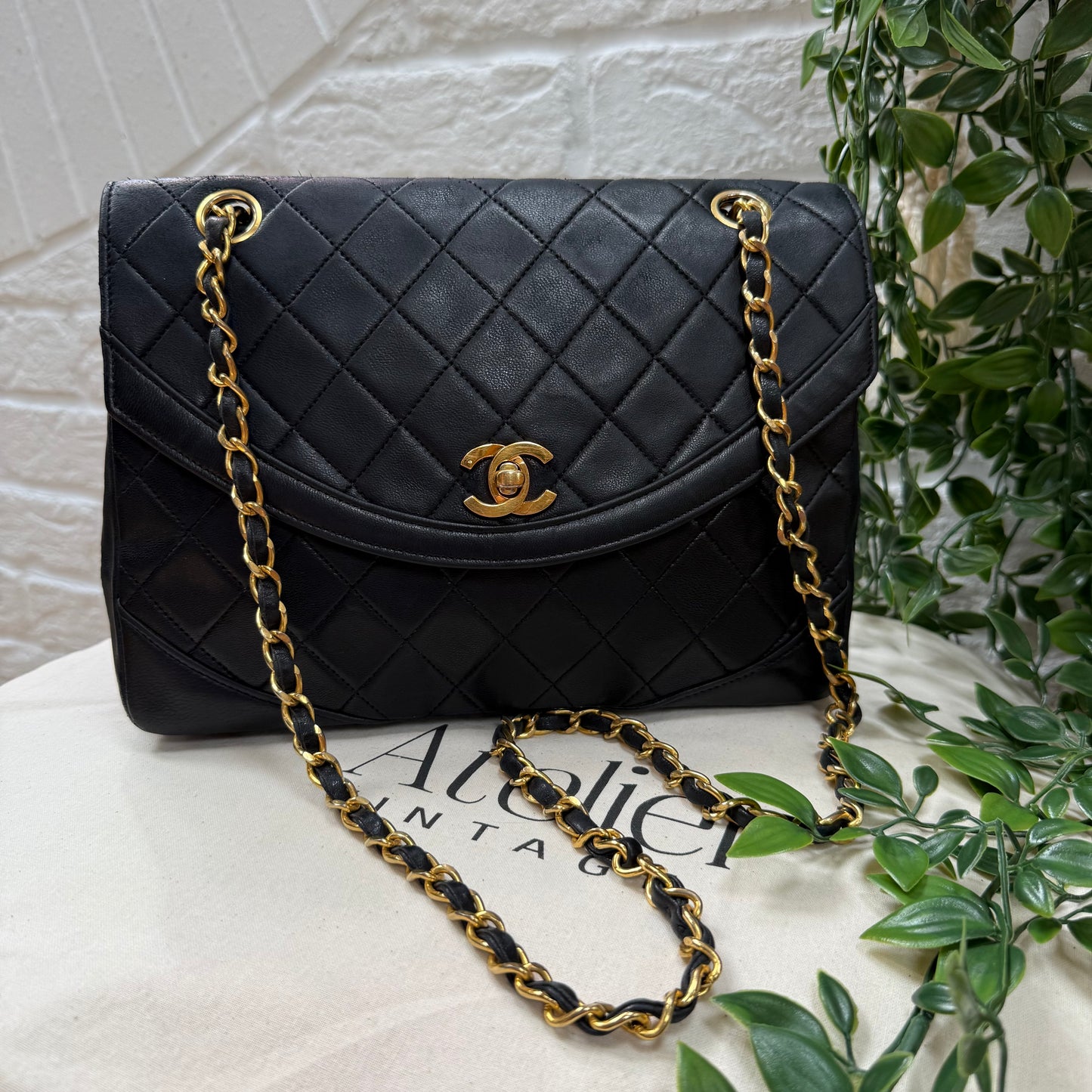 Chanel 1986 black half moon two way single flap