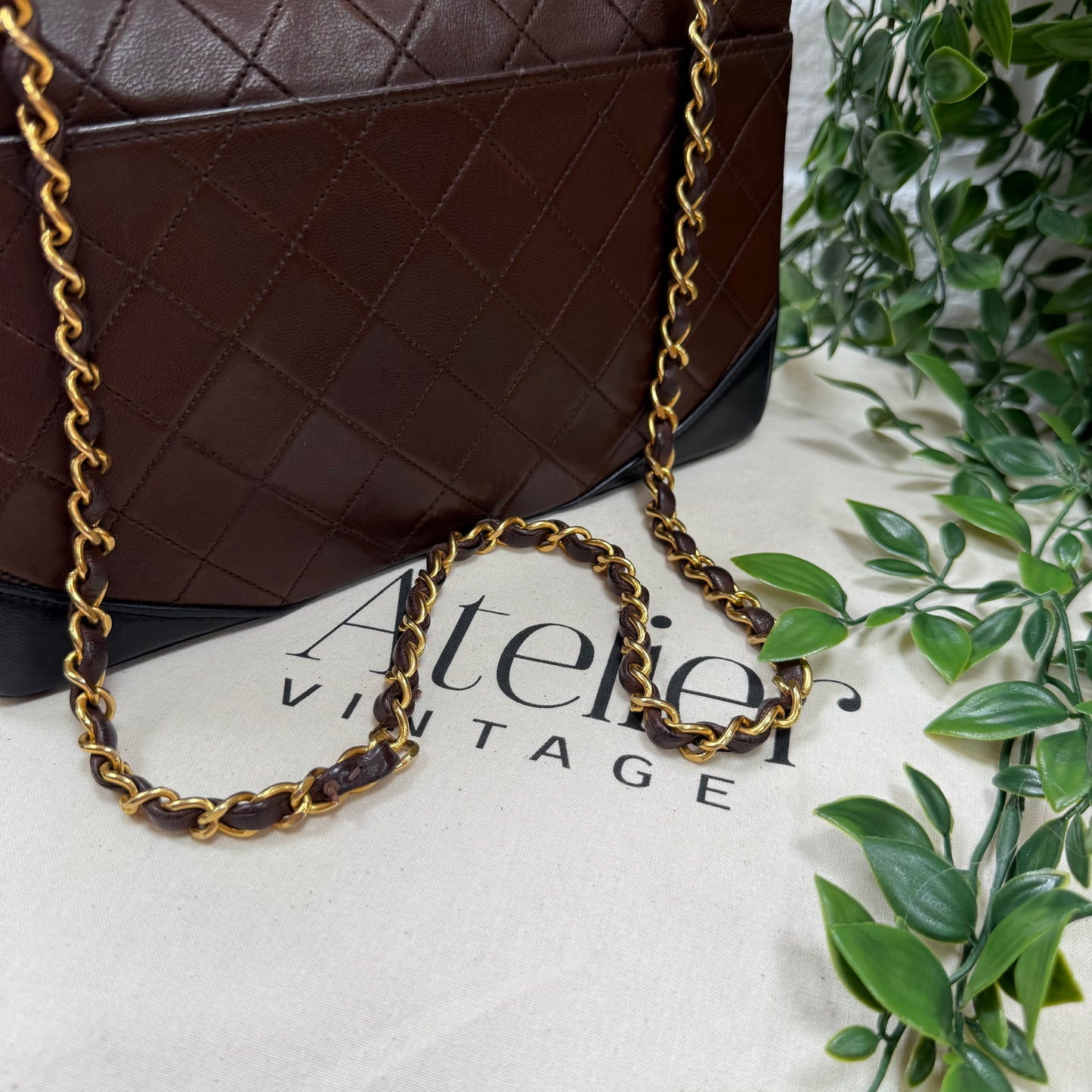 Chanel 1986 chocolate brown & black half moon two way single flap