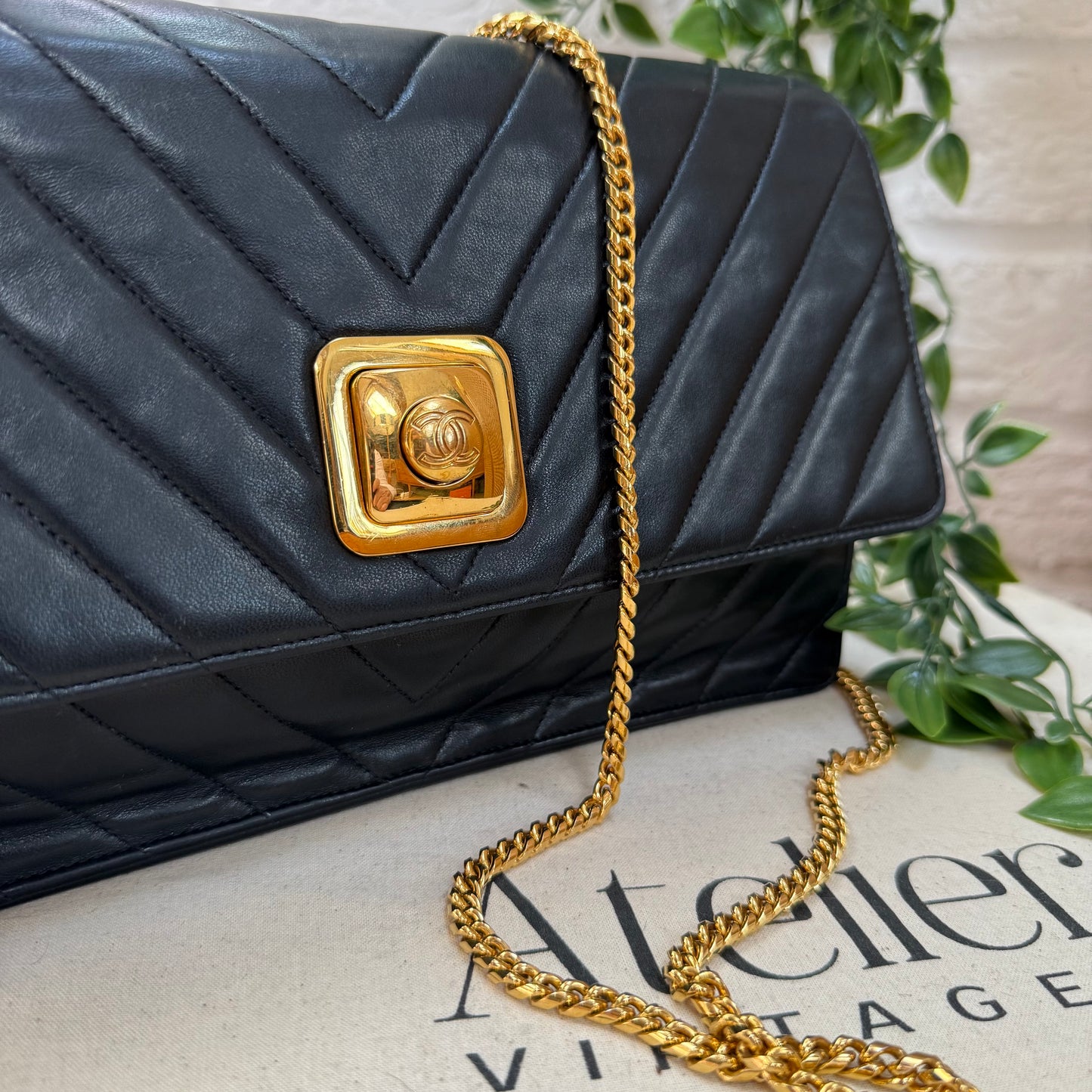 Chanel 1991 Coco CC Button Chevron single Flap