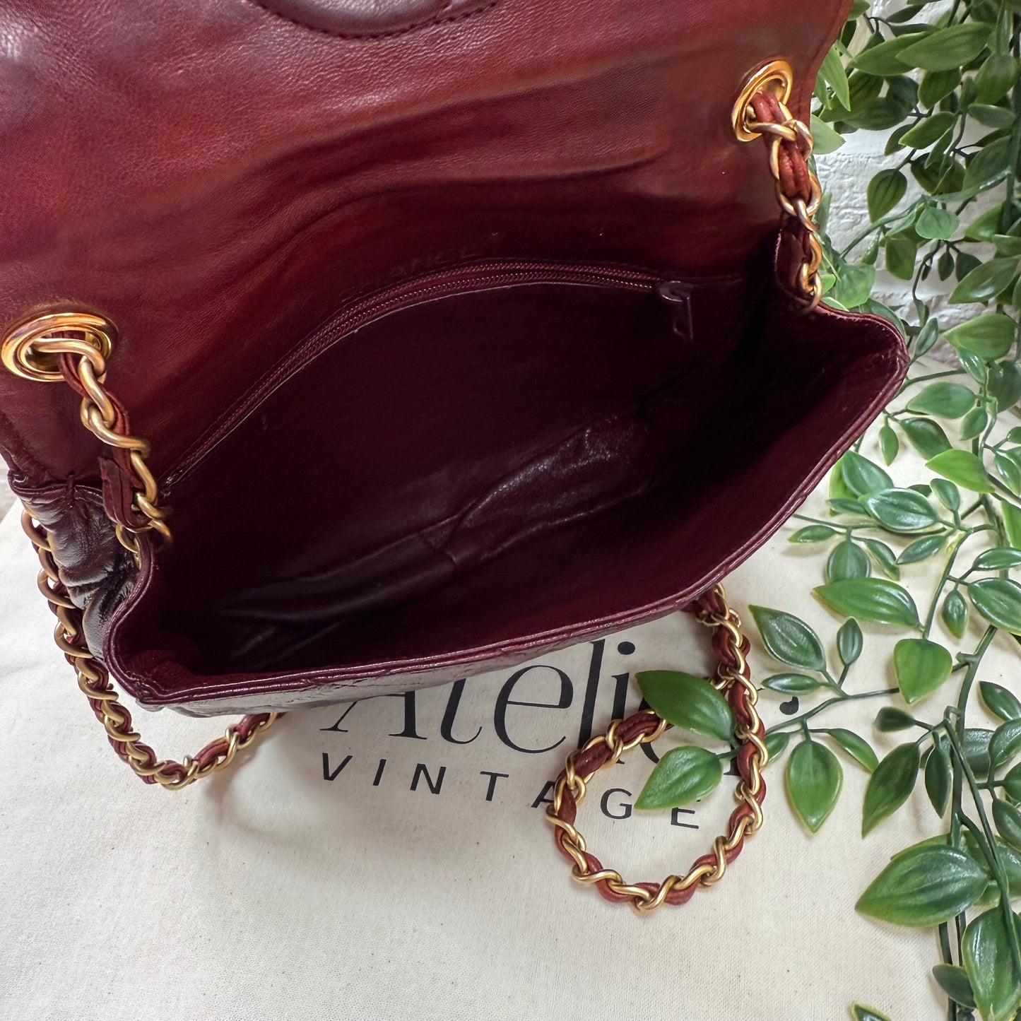 Chanel Early 1980s Bordeaux CC button half moon flap