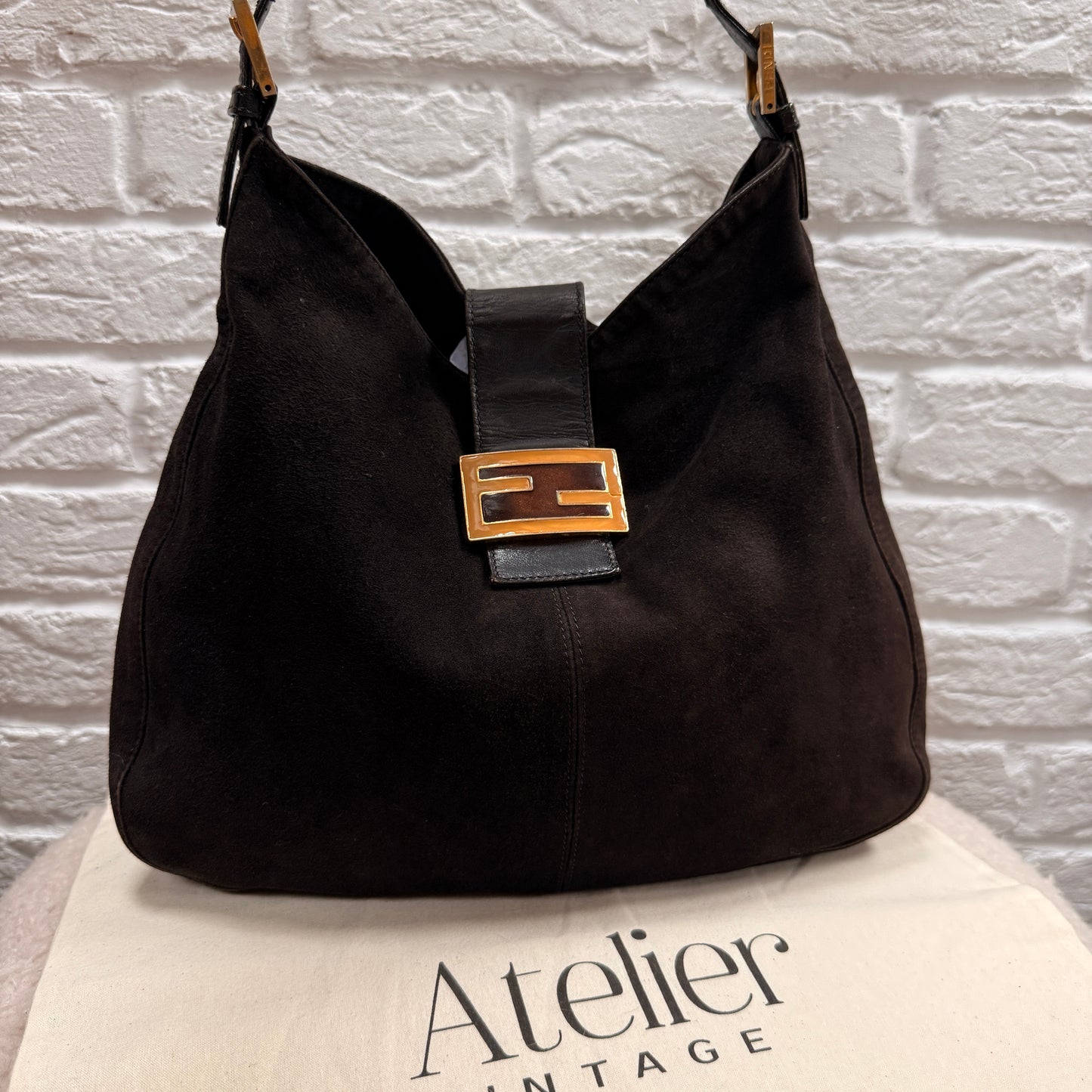 Fendi Rare Fendi Baguette Cross Body Tote in black suede with limited edition enamel closure