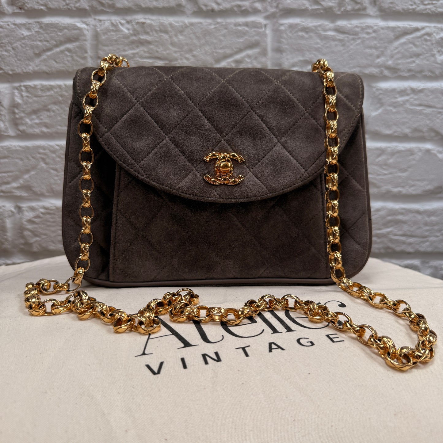 Chanel 1980s Ultra Rare Chanel Limited Edition Bijoux Chain in Taupe Suede and 24k Hold Hardware