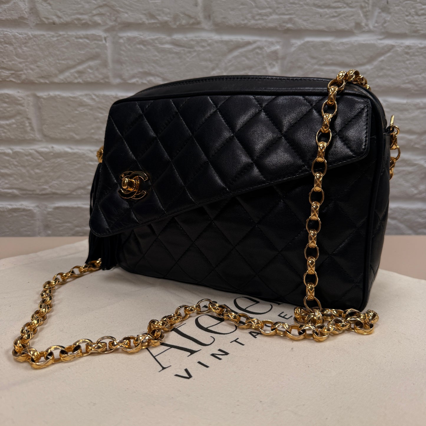Chanel 1991 Rare Turnlock Camera Bag with bijoix chain in black Lambskin leather and 24k gold hardware