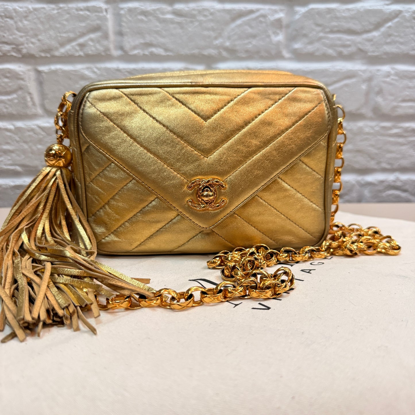 Chanel 1991 Ultra Rare Chevron Quilted Turnlock Camera Bag in Gold Lambskin Leather with 24k gold hardware