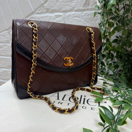 Chanel 1986 chocolate brown & black half moon two way single flap
