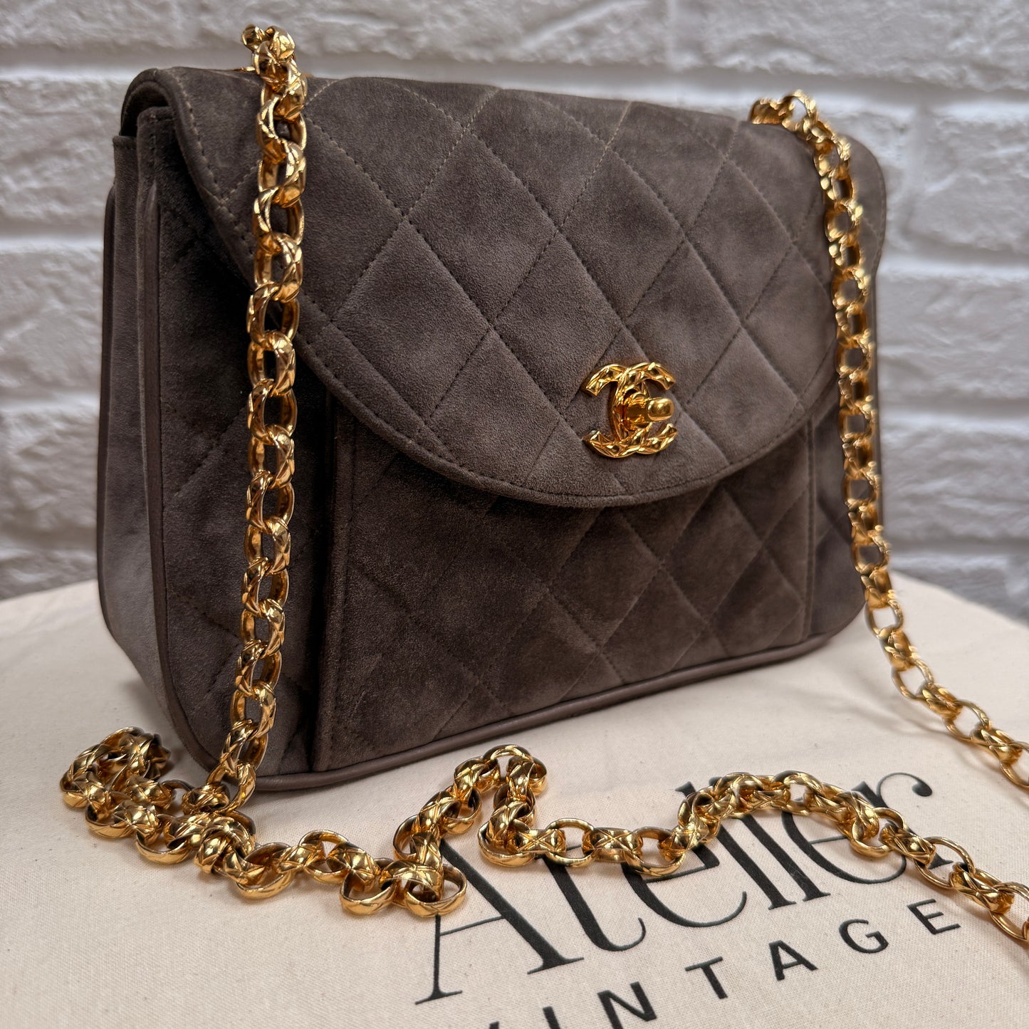 Chanel 1980s Ultra Rare Chanel Limited Edition Bijoux Chain in Taupe Suede and 24k Hold Hardware