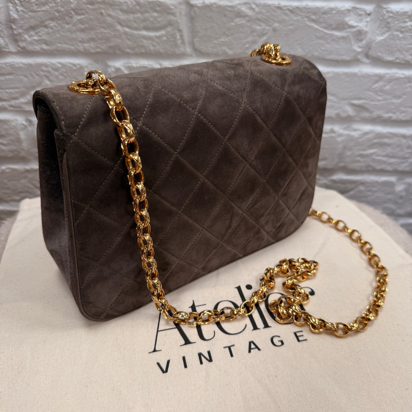 Chanel 1980s Ultra Rare Chanel Limited Edition Bijoux Chain in Taupe Suede and 24k Hold Hardware