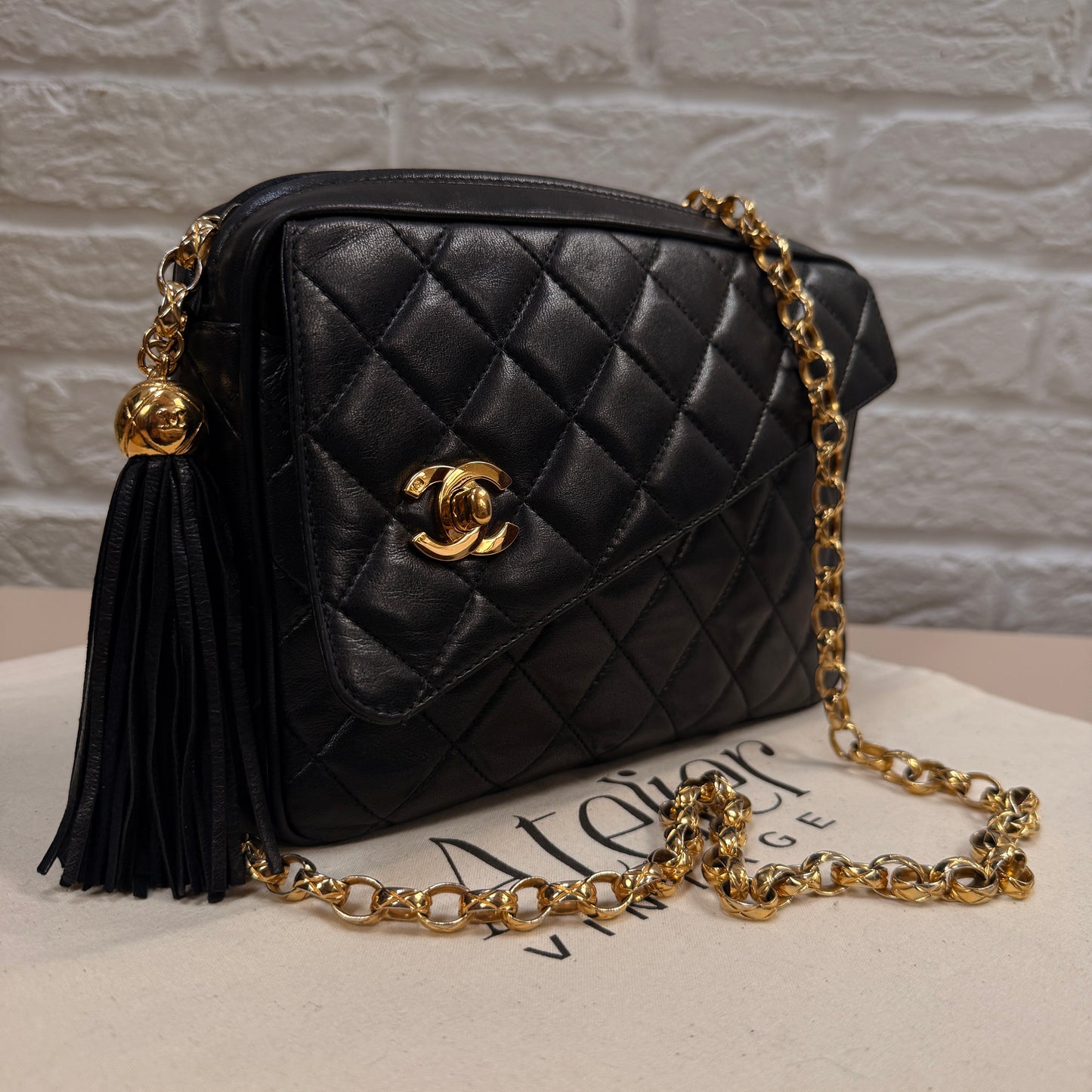 Chanel 1991 Rare Turnlock Camera Bag with bijoix chain in black Lambskin leather and 24k gold hardware