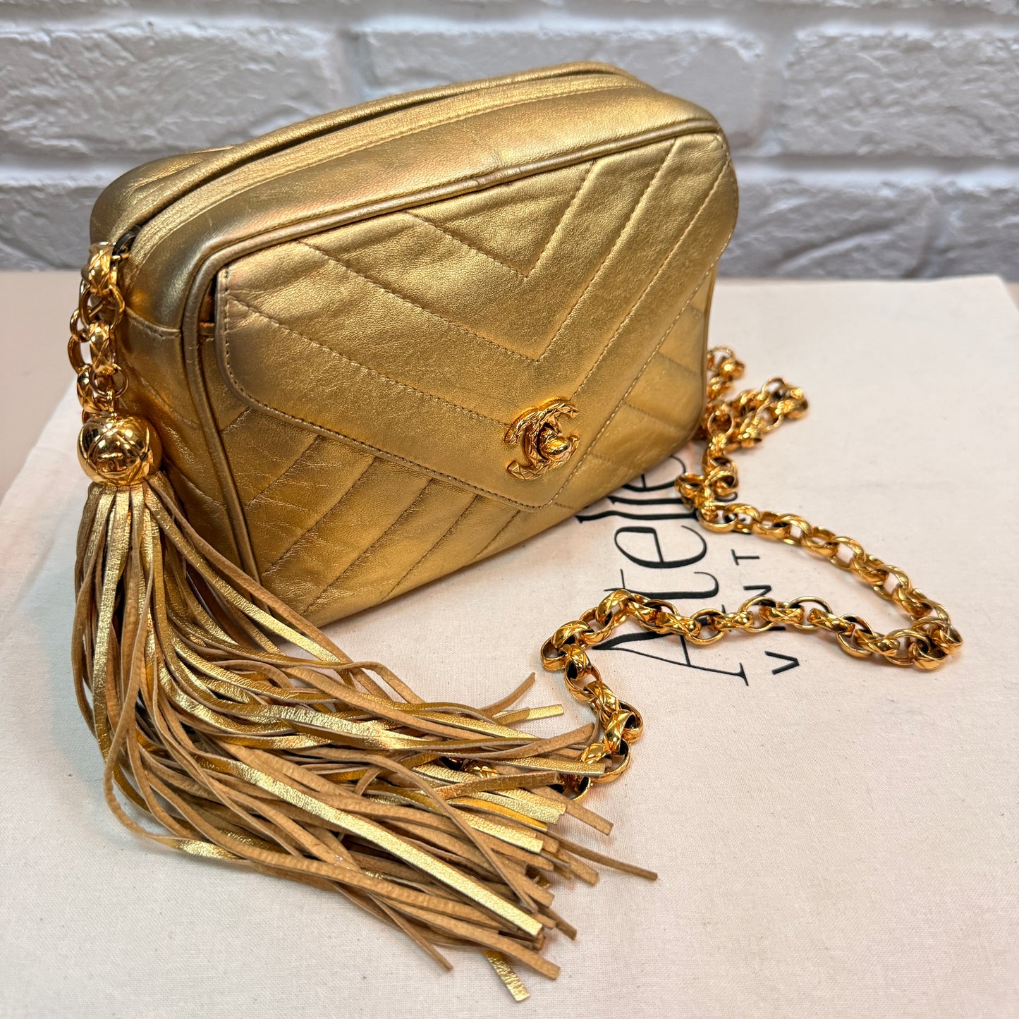 Chanel 1991 Ultra Rare Chevron Quilted Turnlock Camera Bag in Gold Lambskin Leather with 24k gold hardware