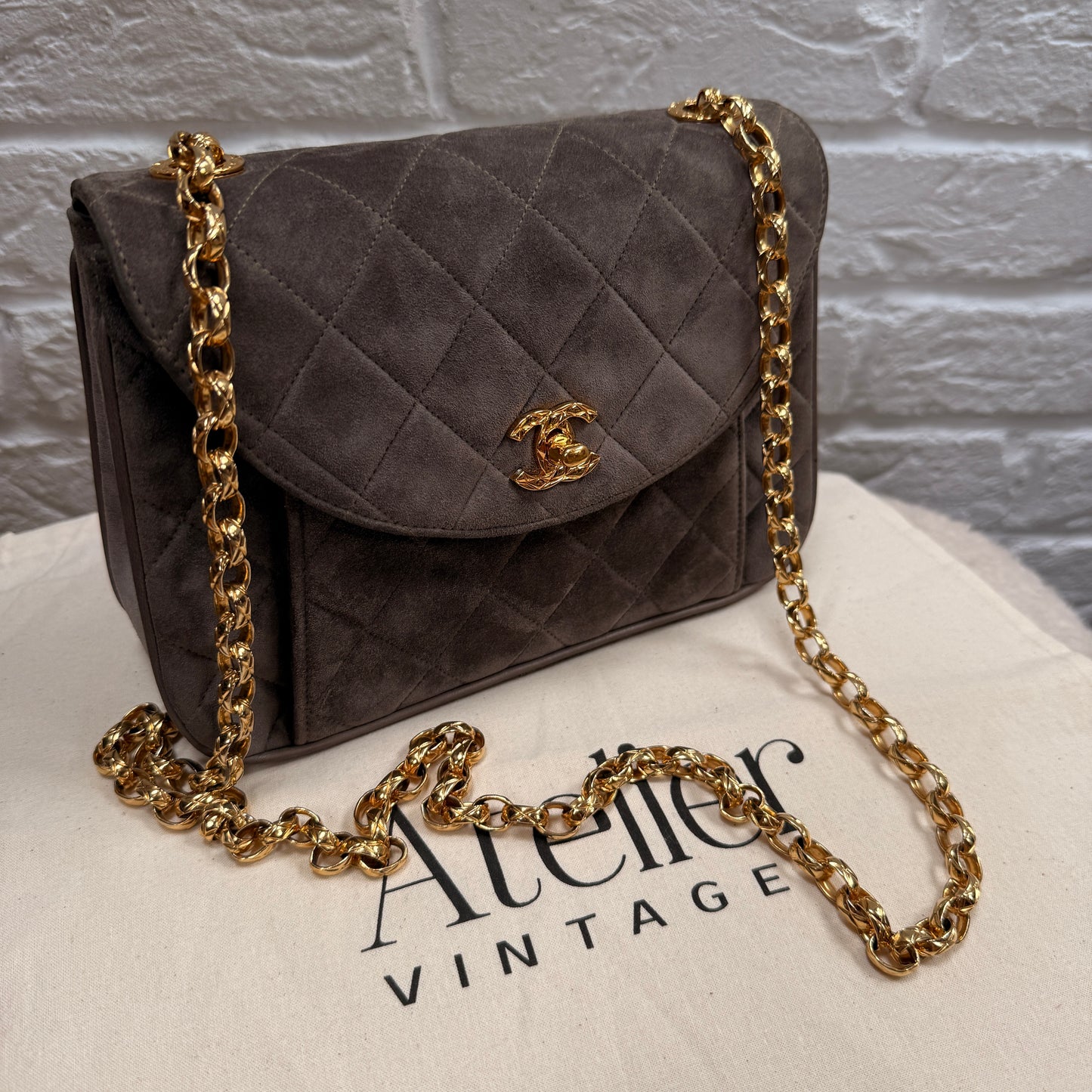 Chanel 1980s Ultra Rare Chanel Limited Edition Bijoux Chain in Taupe Suede and 24k Hold Hardware