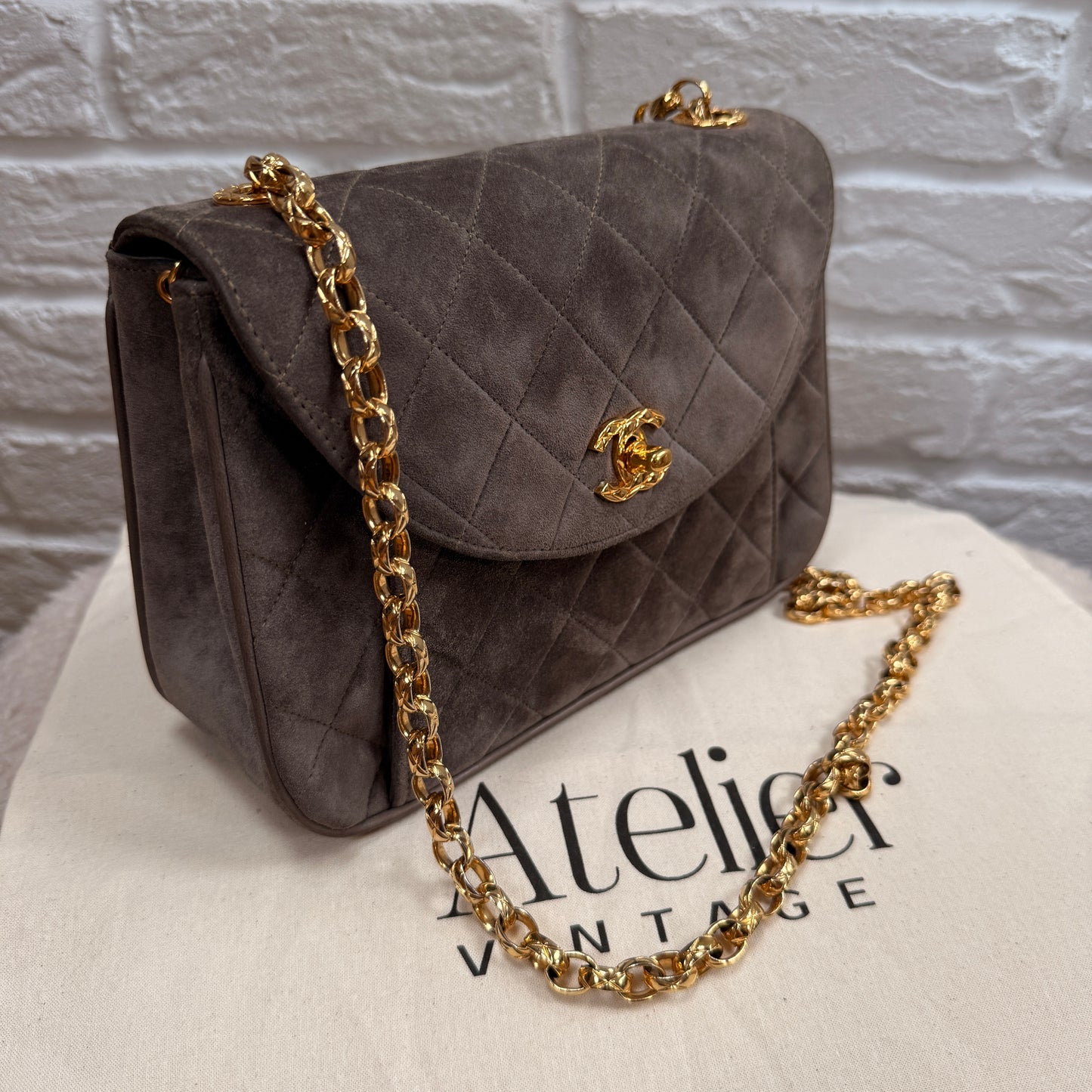 Chanel 1980s Ultra Rare Chanel Limited Edition Bijoux Chain in Taupe Suede and 24k Hold Hardware