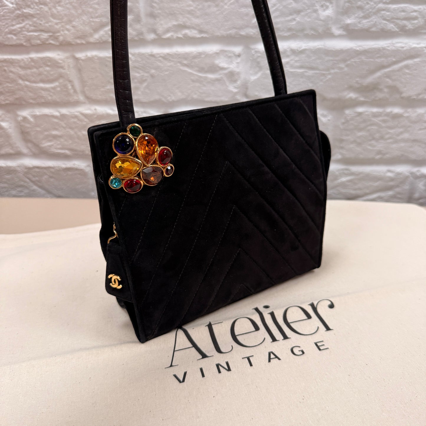 Chanel 1989 Chanel Black Suede & Leather Cross body with rare Gripoix Stone and CC charm Zip Pull