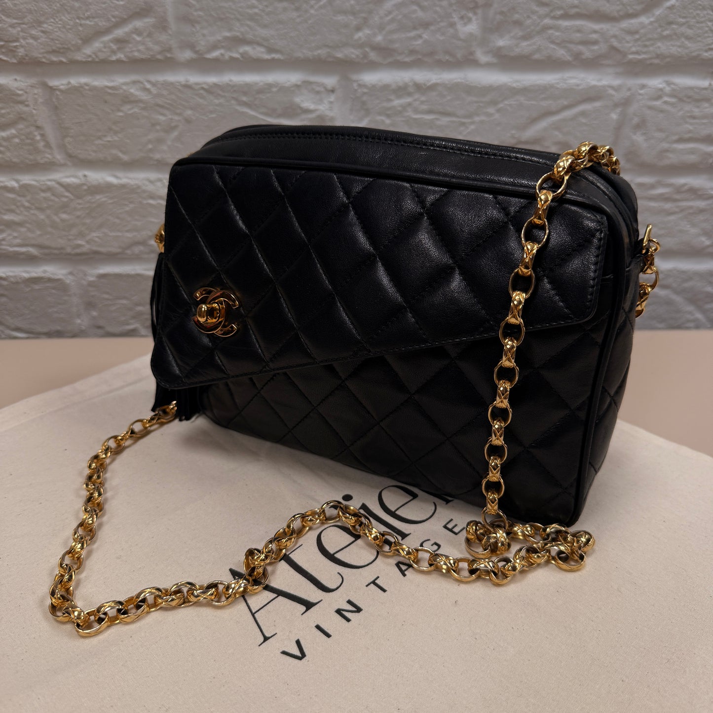 Chanel 1991 Rare Turnlock Camera Bag with bijoix chain in black Lambskin leather and 24k gold hardware