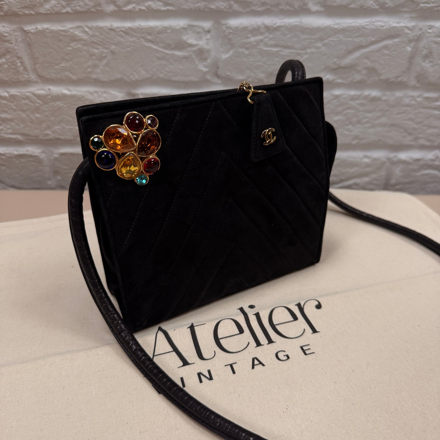 Chanel 1989 Chanel Black Suede & Leather Cross body with rare Gripoix Stone and CC charm Zip Pull