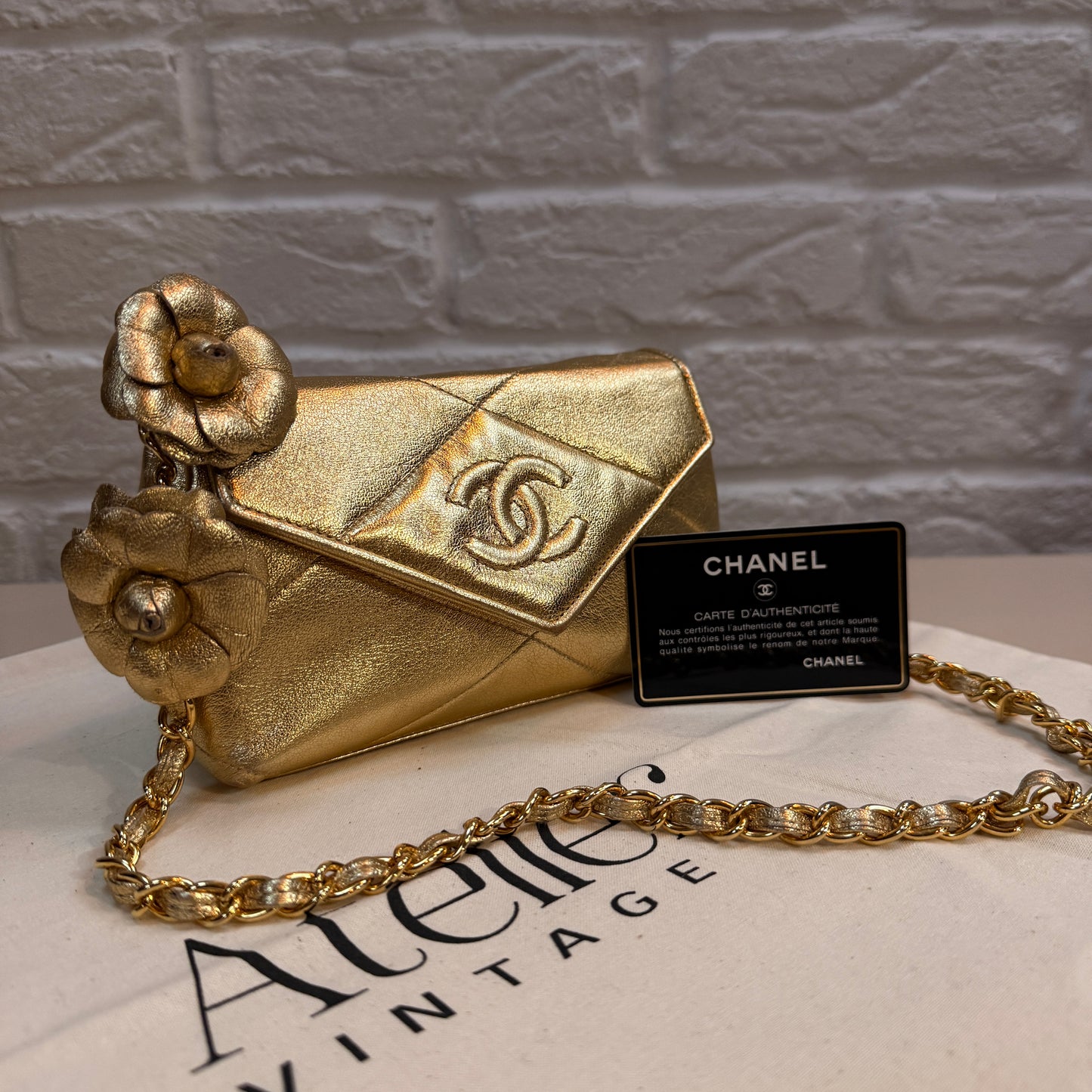 Chanel 1986 Ultra Rare Gold Lambskin Camellia Charm Envelope Flap