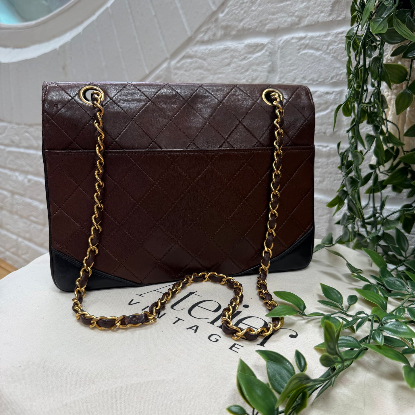 Chanel 1986 chocolate brown & black half moon two way single flap