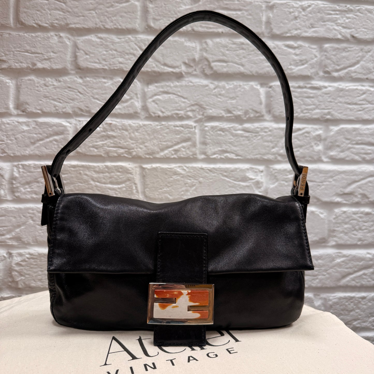 Fendi 1990s Original Fendi Baguette in black leather with limited edition animal print closure