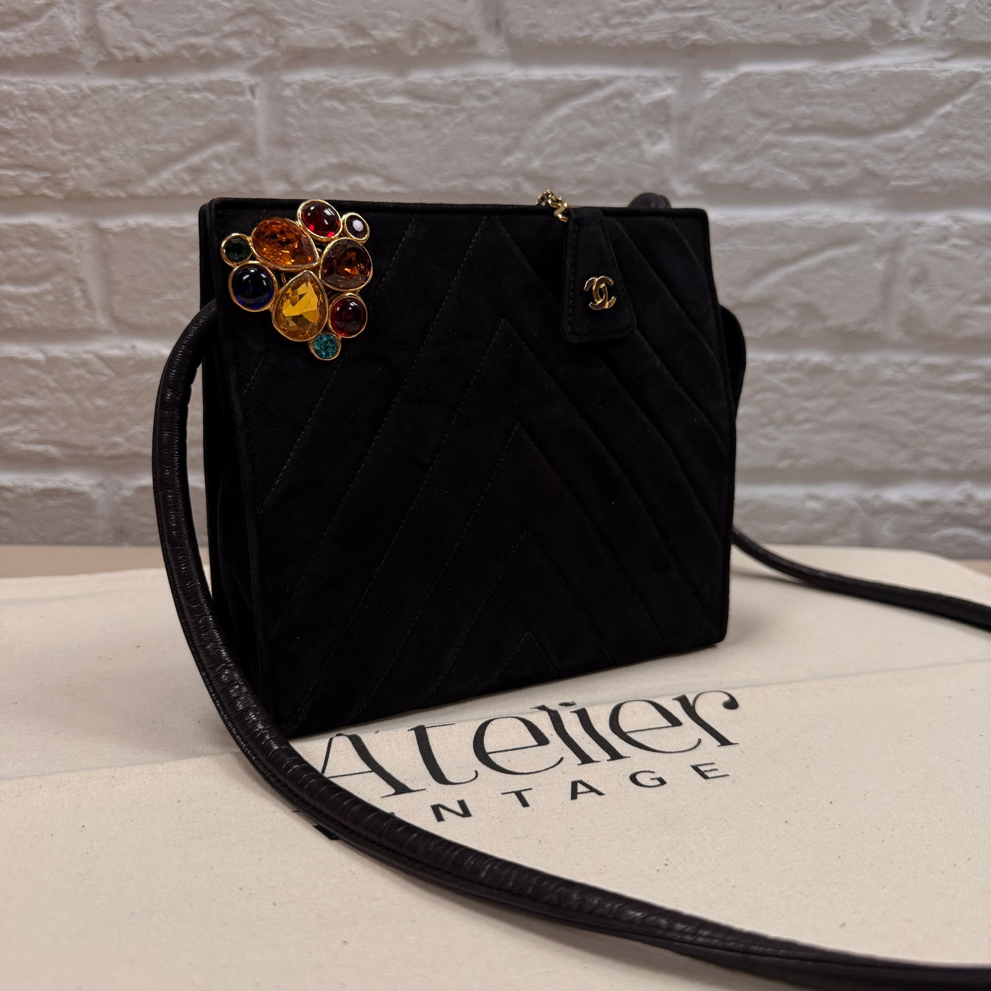 Chanel 1989 Chanel Black Suede & Leather Cross body with rare Gripoix Stone and CC charm Zip Pull