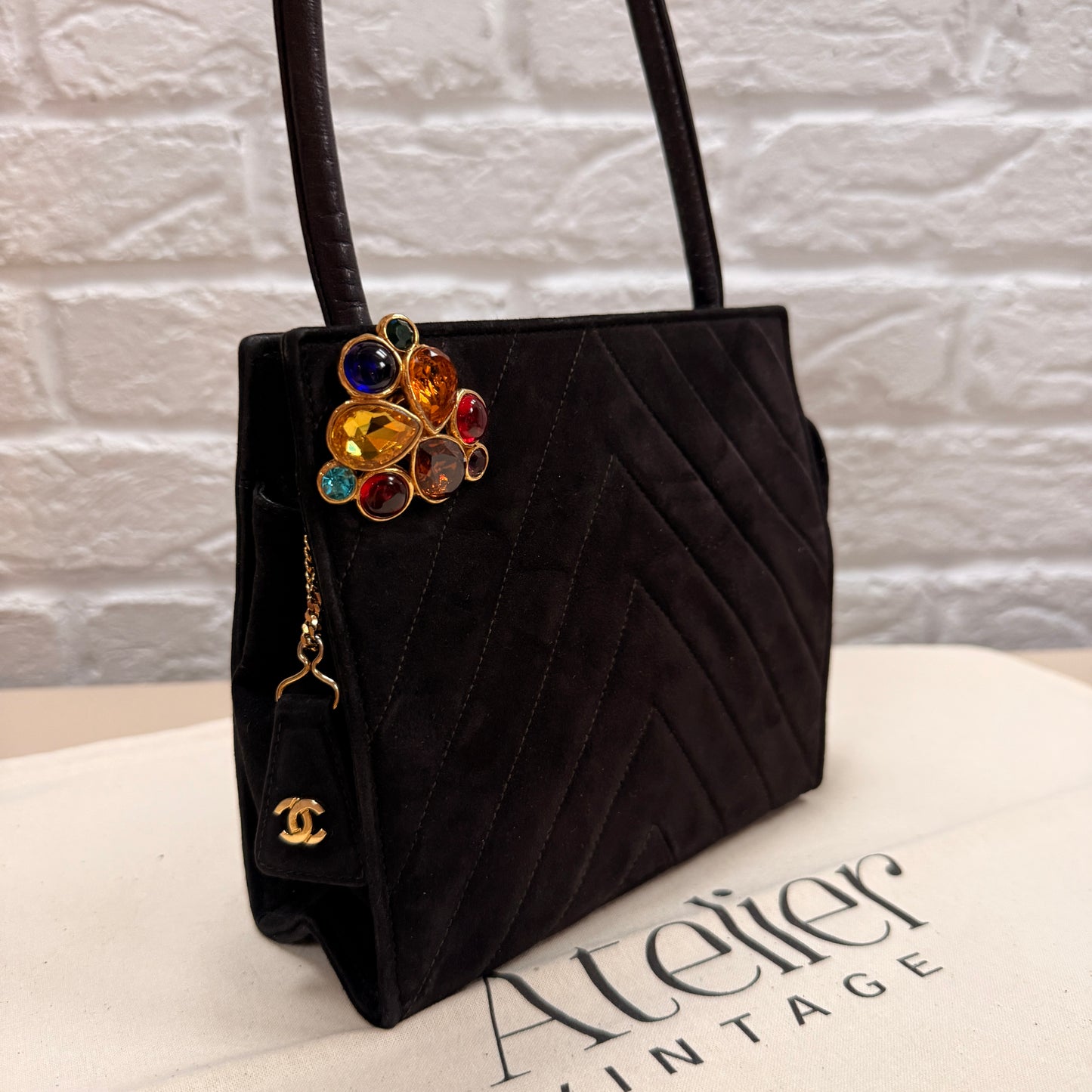 Chanel 1989 Chanel Black Suede & Leather Cross body with rare Gripoix Stone and CC charm Zip Pull