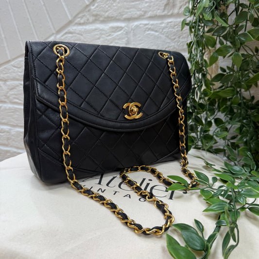 Chanel 1986 black half moon two way single flap