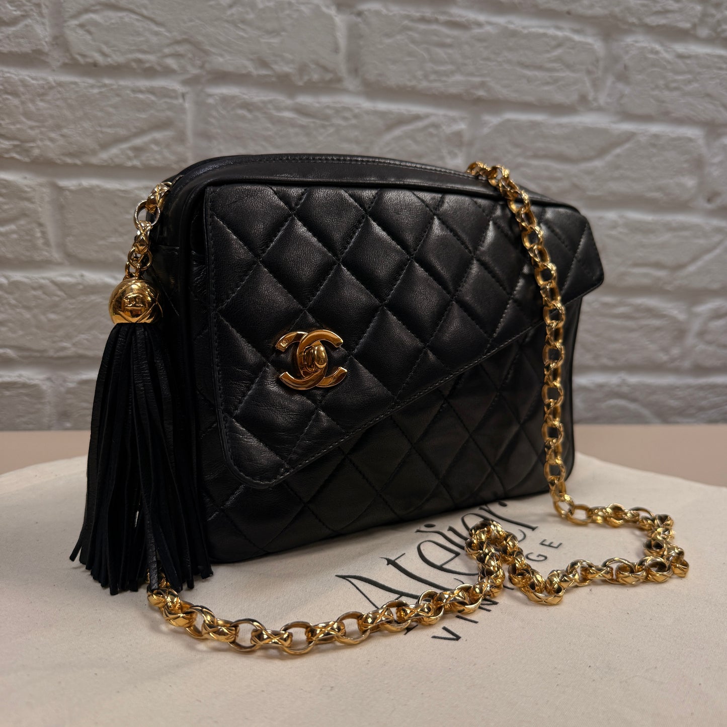 Chanel 1991 Rare Turnlock Camera Bag with bijoix chain in black Lambskin leather and 24k gold hardware