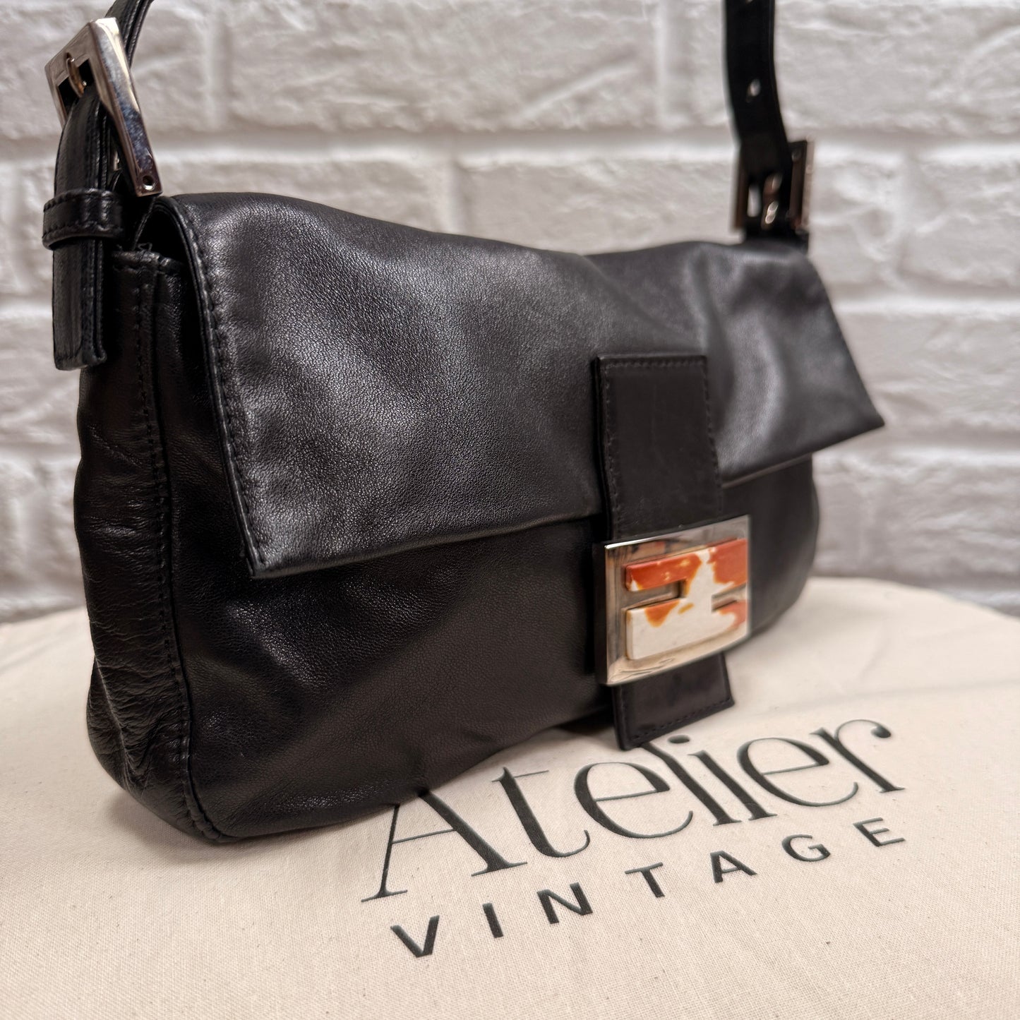 Fendi 1990s Original Fendi Baguette in black leather with limited edition animal print closure