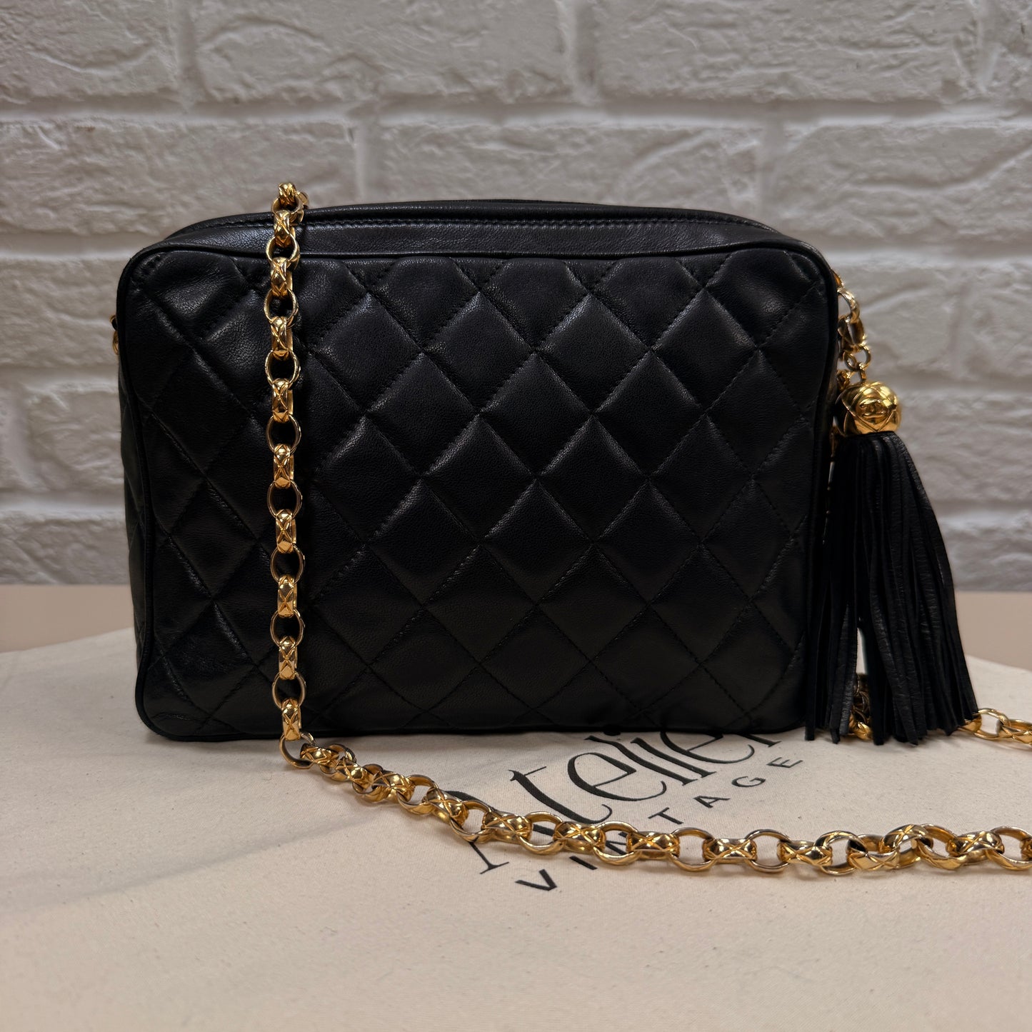 Chanel 1991 Rare Turnlock Camera Bag with bijoix chain in black Lambskin leather and 24k gold hardware