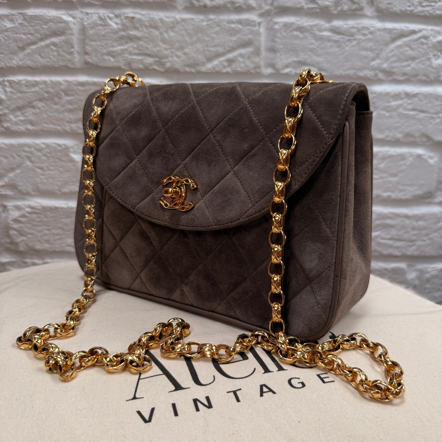 Chanel 1980s Ultra Rare Chanel Limited Edition Bijoux Chain in Taupe Suede and 24k Hold Hardware