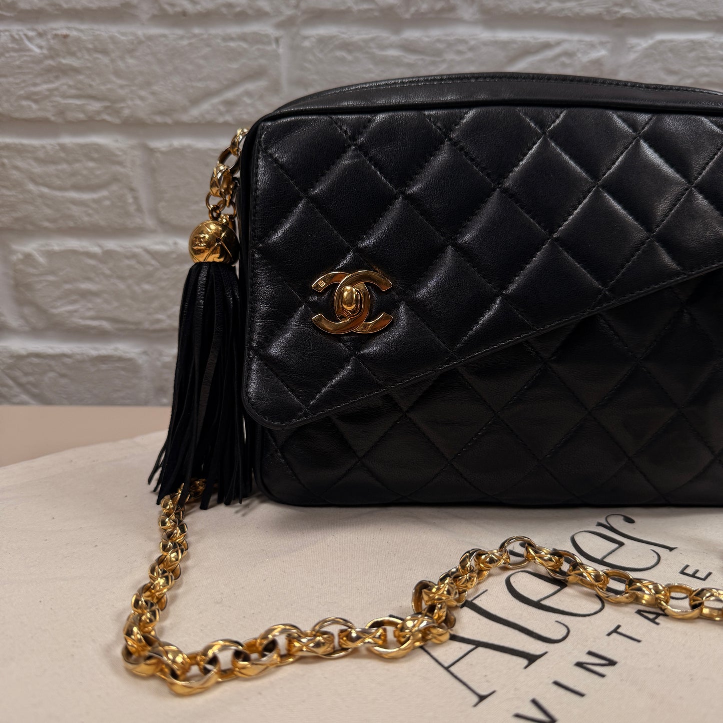 Chanel 1991 Rare Turnlock Camera Bag with bijoix chain in black Lambskin leather and 24k gold hardware