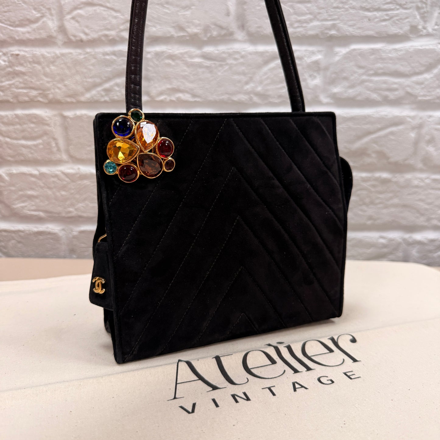 Chanel 1989 Chanel Black Suede & Leather Cross body with rare Gripoix Stone and CC charm Zip Pull